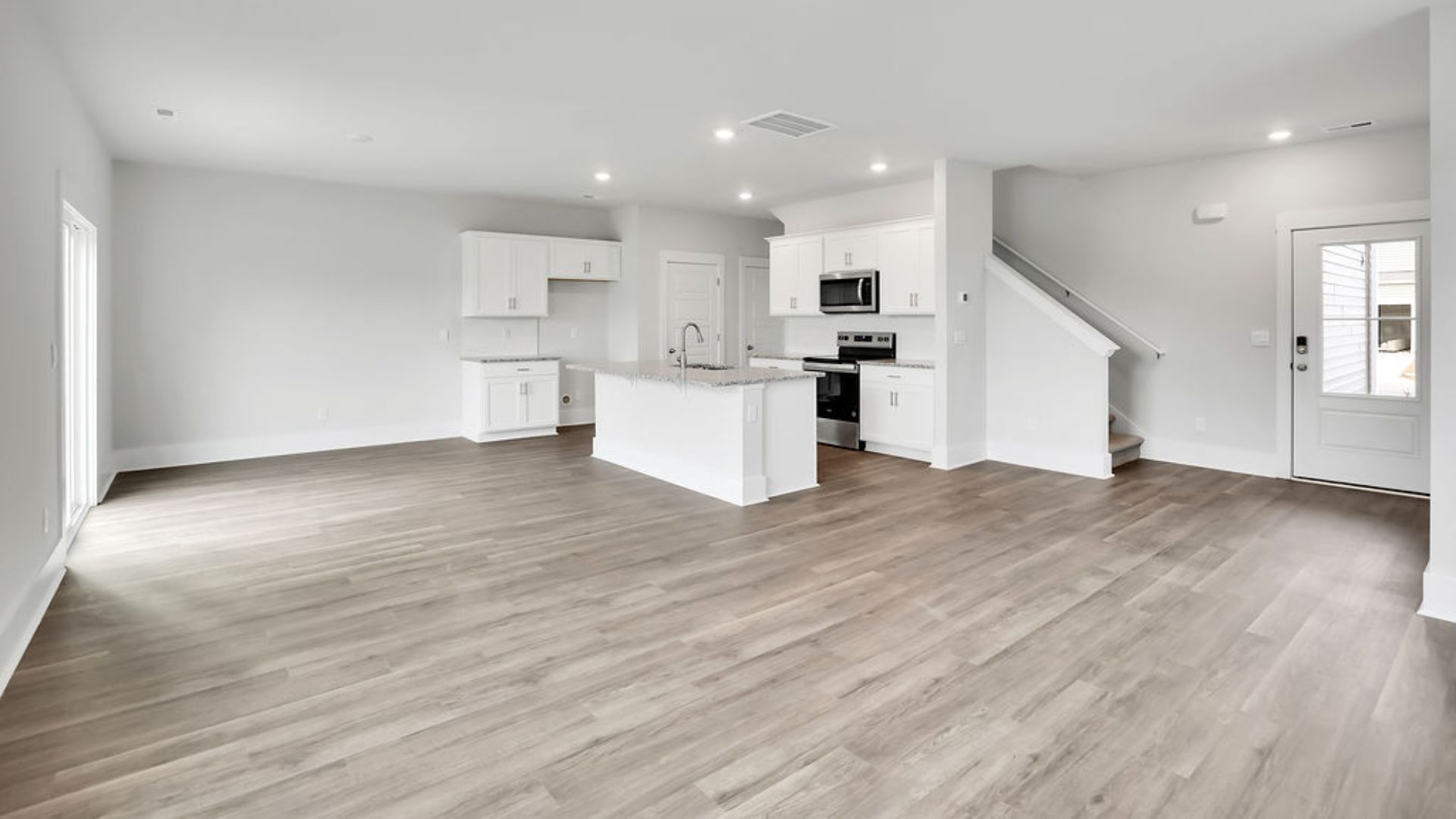 This new home will feature 9 ft. ceilings, beautiful quartz kitchen countertops, granite countertops in the two full bathrooms, luxury vinyl plank flooring, a cozy Patio.