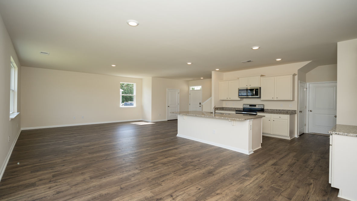 The living area is an open concept, where your kitchen, living, and dining areas blend seamlessly into a space perfect for everyday living and entertaining.