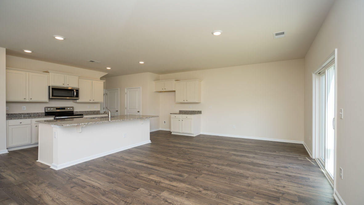 The living area is an open concept, where your kitchen, living, and dining areas blend seamlessly into a space perfect for everyday living and entertaining.