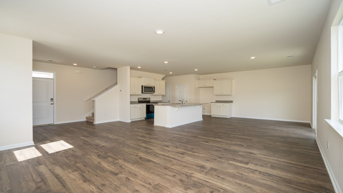 The living area is an open concept, where your kitchen, living, and dining areas blend seamlessly into a space perfect for everyday living and entertaining.