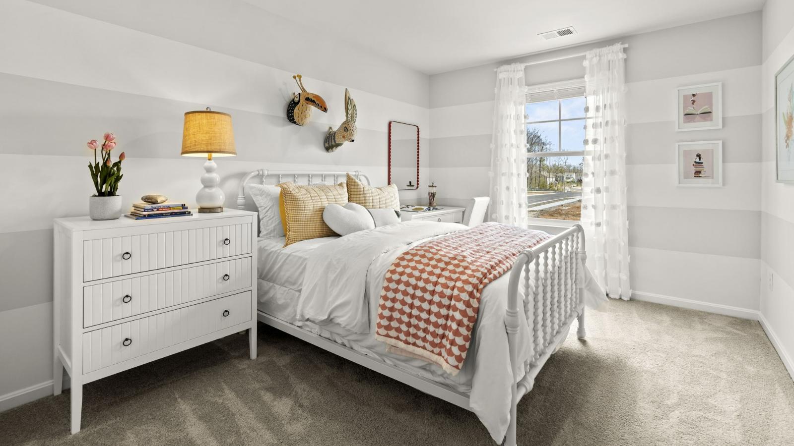 The additional three spacious bedrooms allow for everyone to have privacy and share access to the second full bathroom