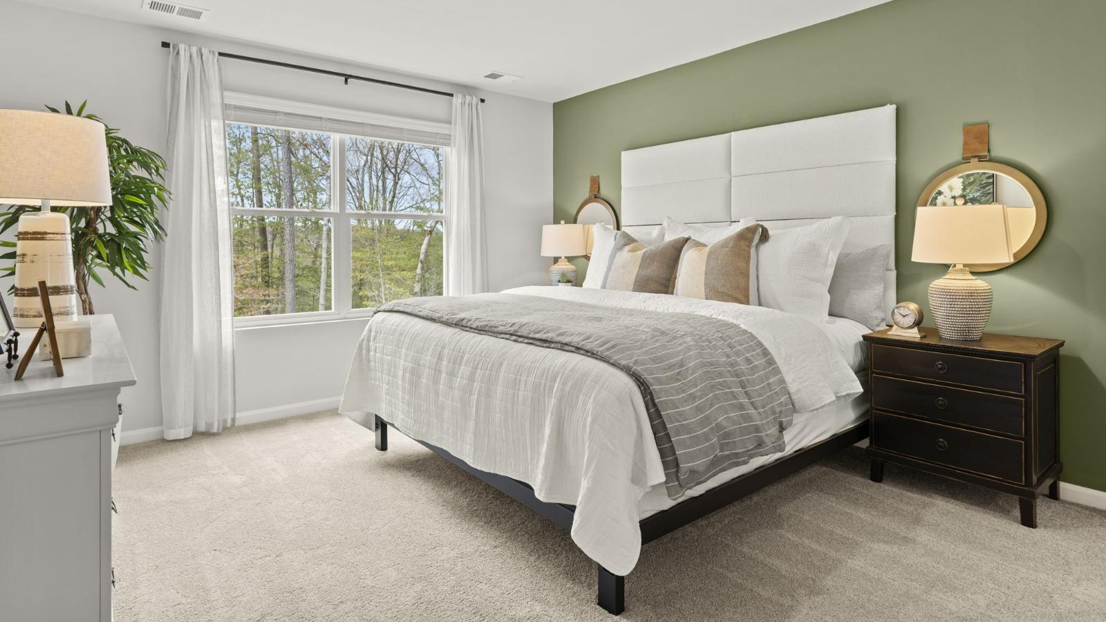 Upstairs you will find the primary suite complete with a private, double bowl vanity bathroom and two oversized walk-in closets.