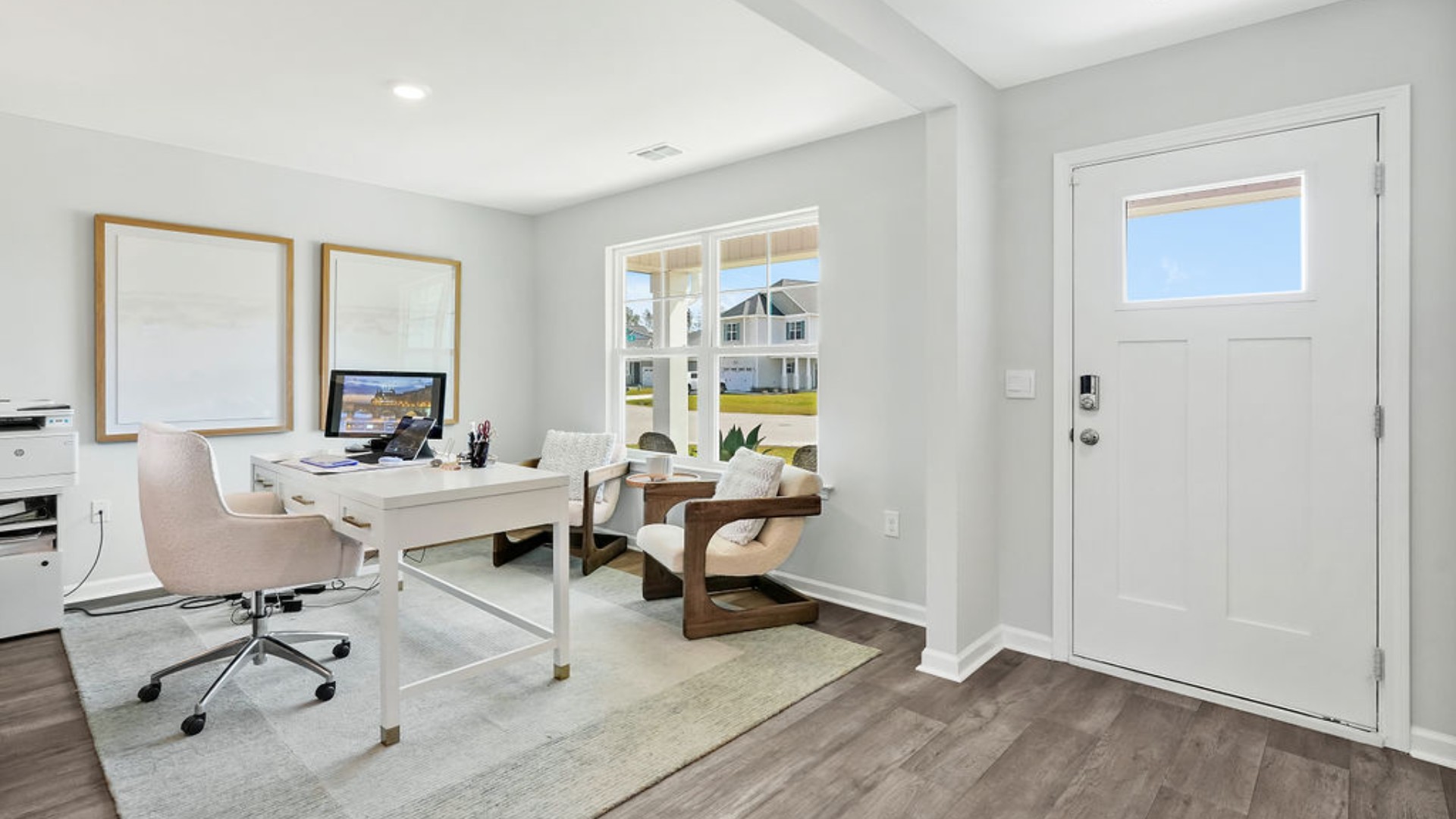 Upstairs, the Primary Suite offers a private bathroom, and the rest of the second floor includes three additional bedrooms and a convenient laundry room