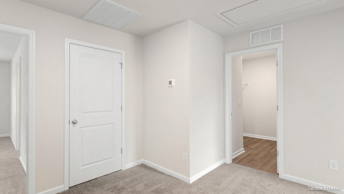 The primary bedroom has its own attached bathroom that features a walk-in closet and all the space you need to get ready in the morning.