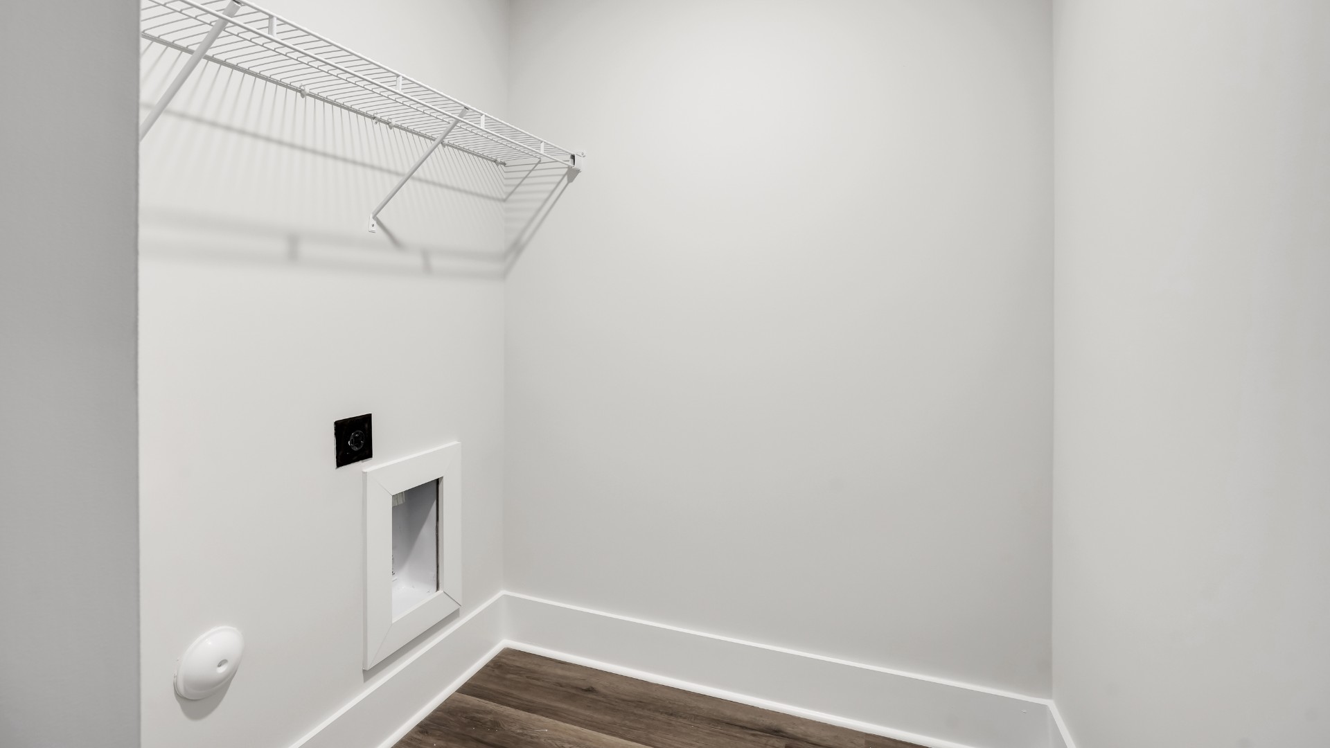 the rest of the second floor includes three additional bedrooms and a convenient laundry room.