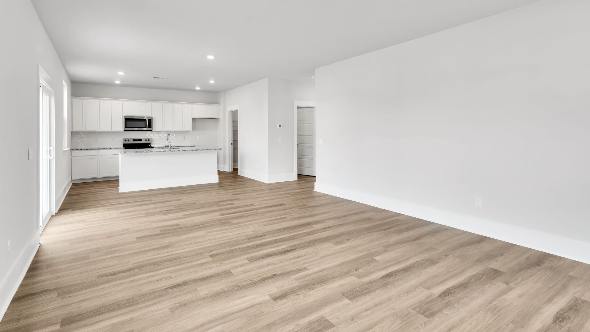 The living area is an open concept, where your kitchen, living, and dining areas blend seamlessly into a space perfect for everyday living and entertaining