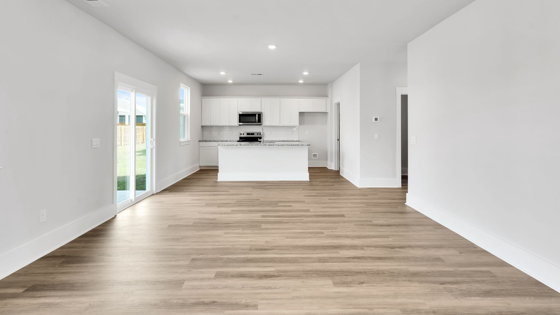 The living area is an open concept, where your kitchen, living, and dining areas blend seamlessly into a space perfect for everyday living and entertaining