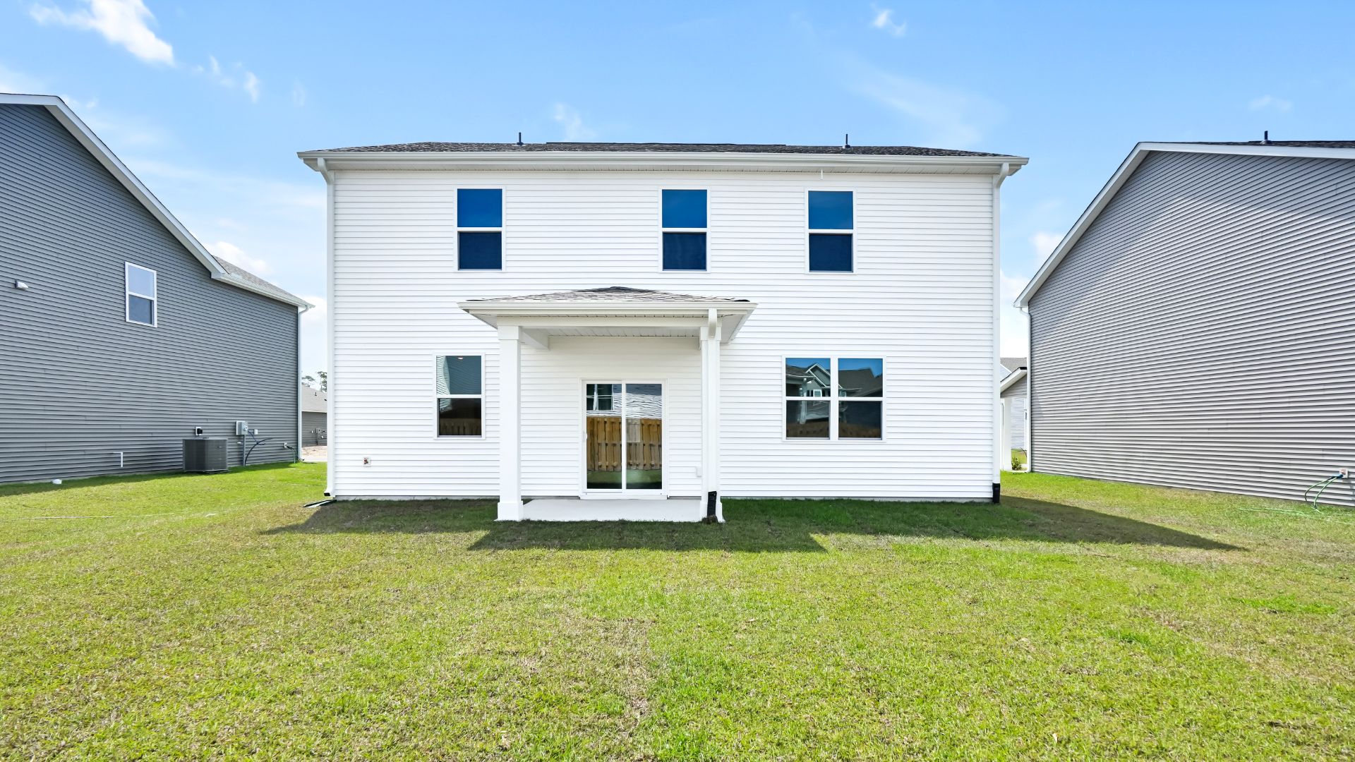 Enjoy the covered porch perfect for entertaining and enjoying the Carolina evenings.