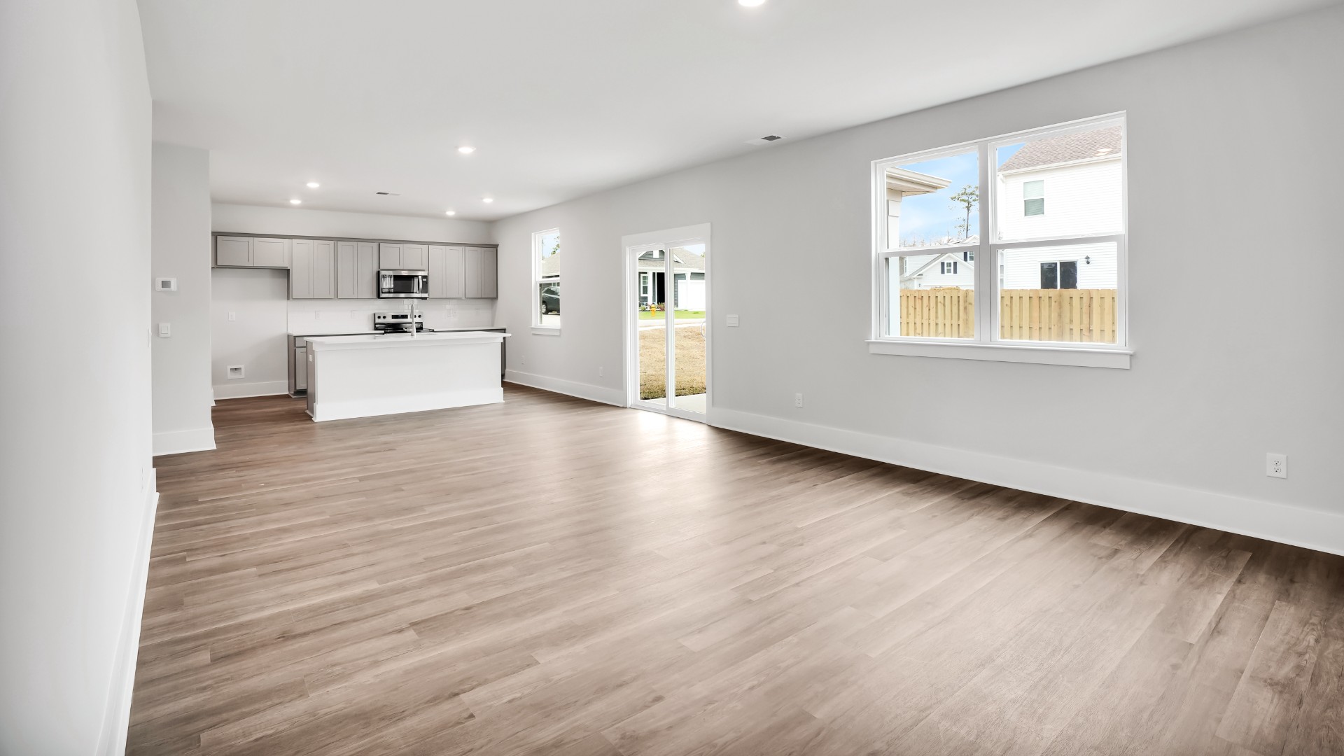 The living area is an open concept, where your kitchen, living, and dining areas blend seamlessly into a space perfect for everyday living and