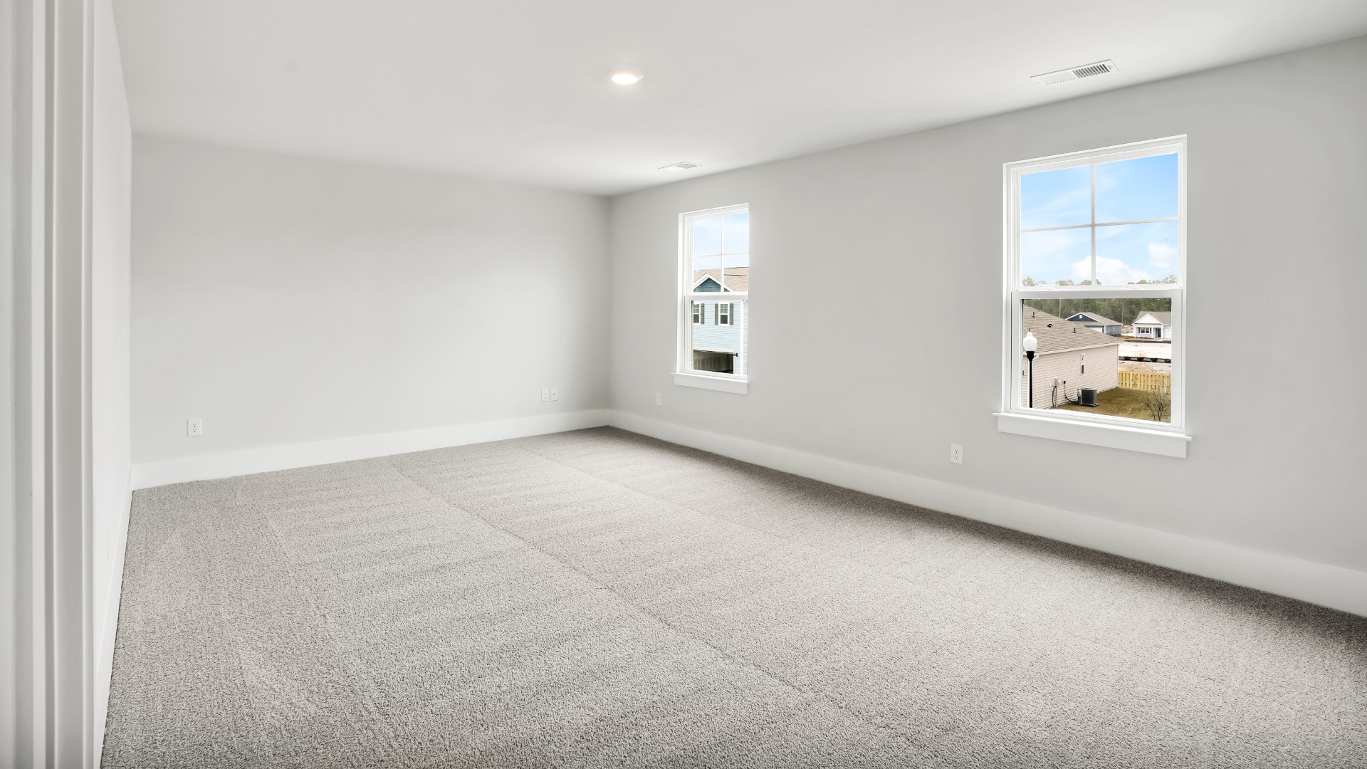 Upstairs, the primary bedroom has its own attached bathroom that features a walk-in closet and all the space you need to get ready in the morning.