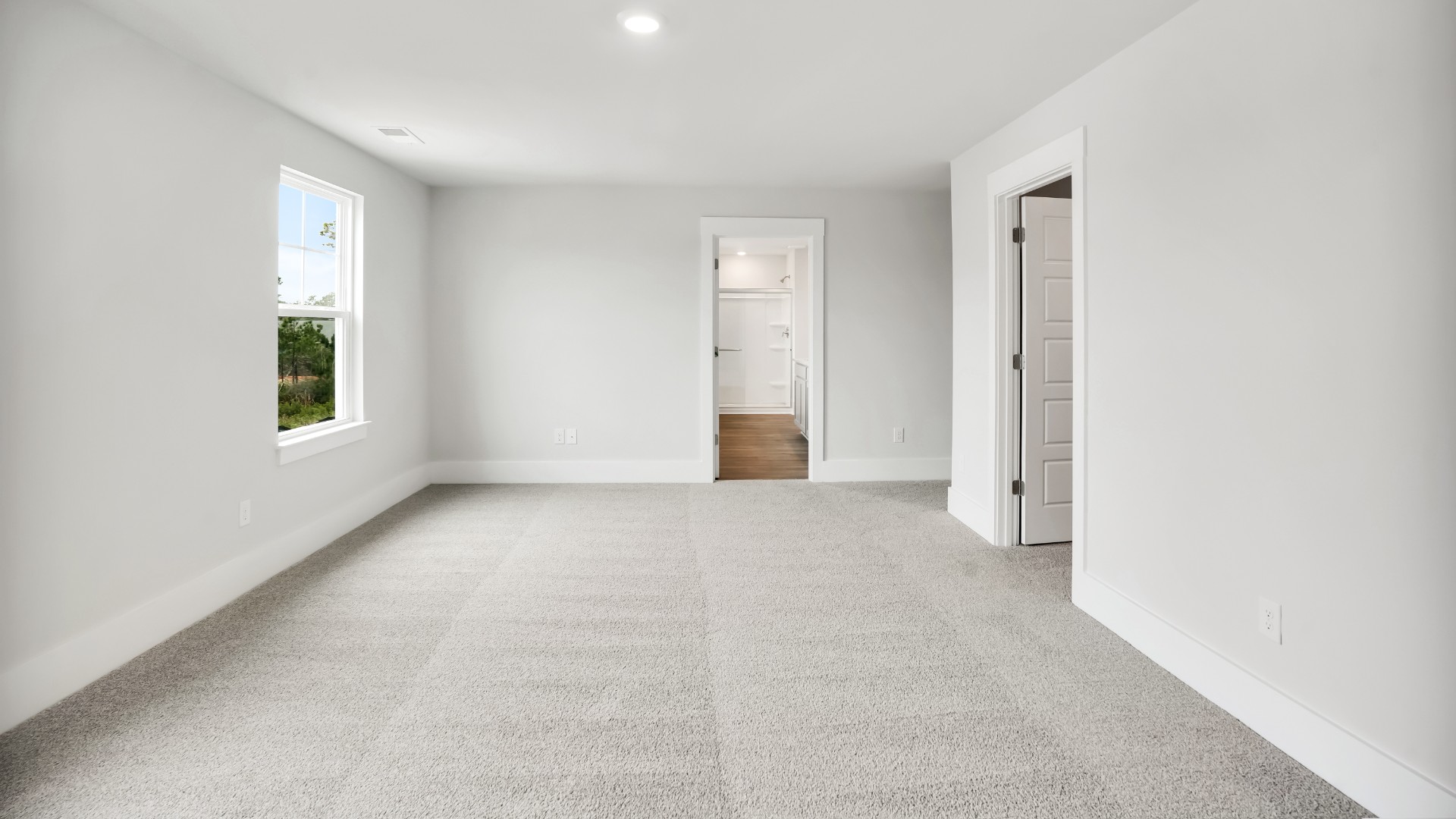 Upstairs, the primary bedroom has its own attached bathroom that features a walk-in closet and all the space you need to get ready in the morning.