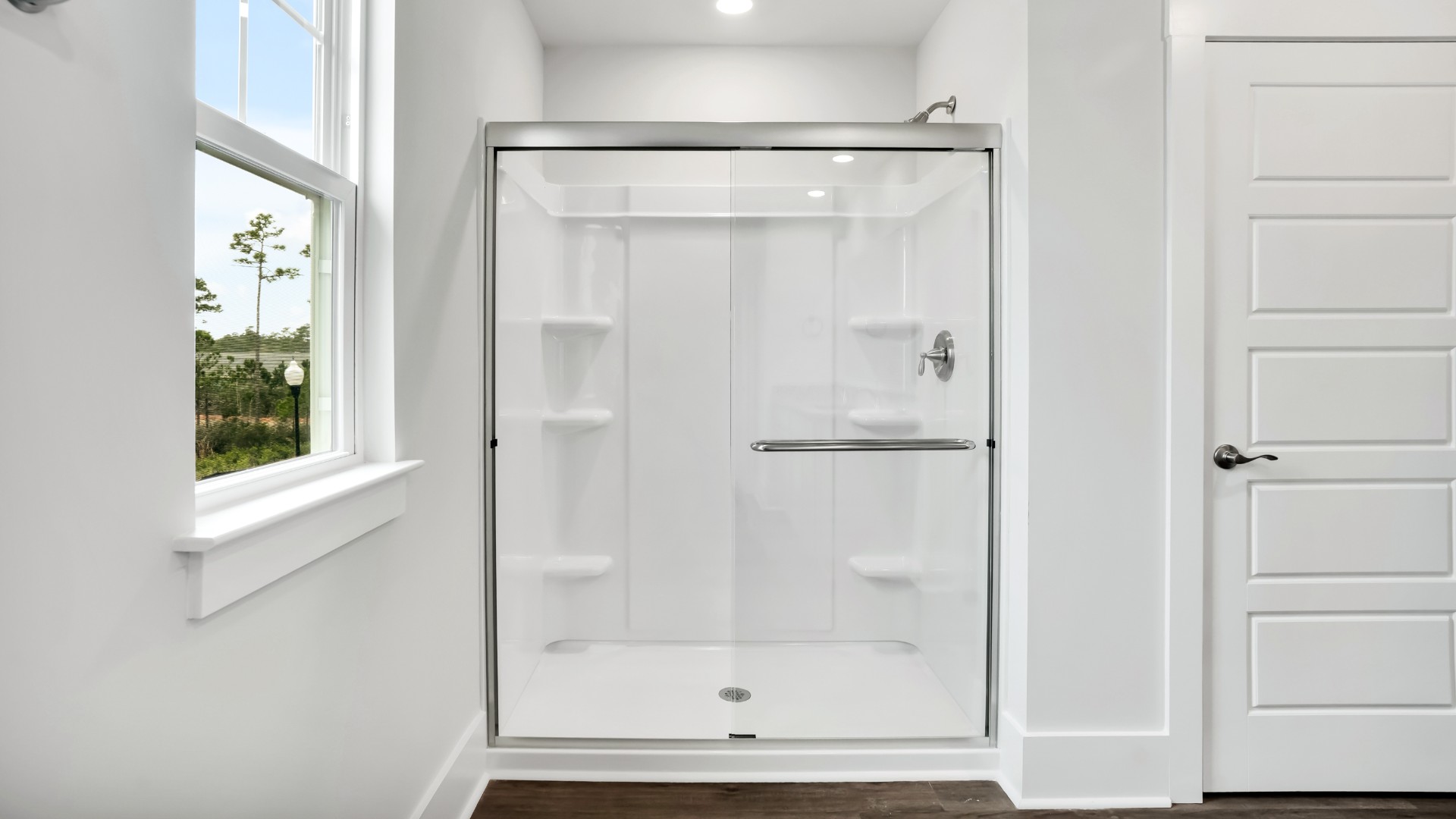 Upstairs, the primary bedroom has its own attached bathroom that features a walk-in closet and all the space you need to get ready in the morning.
