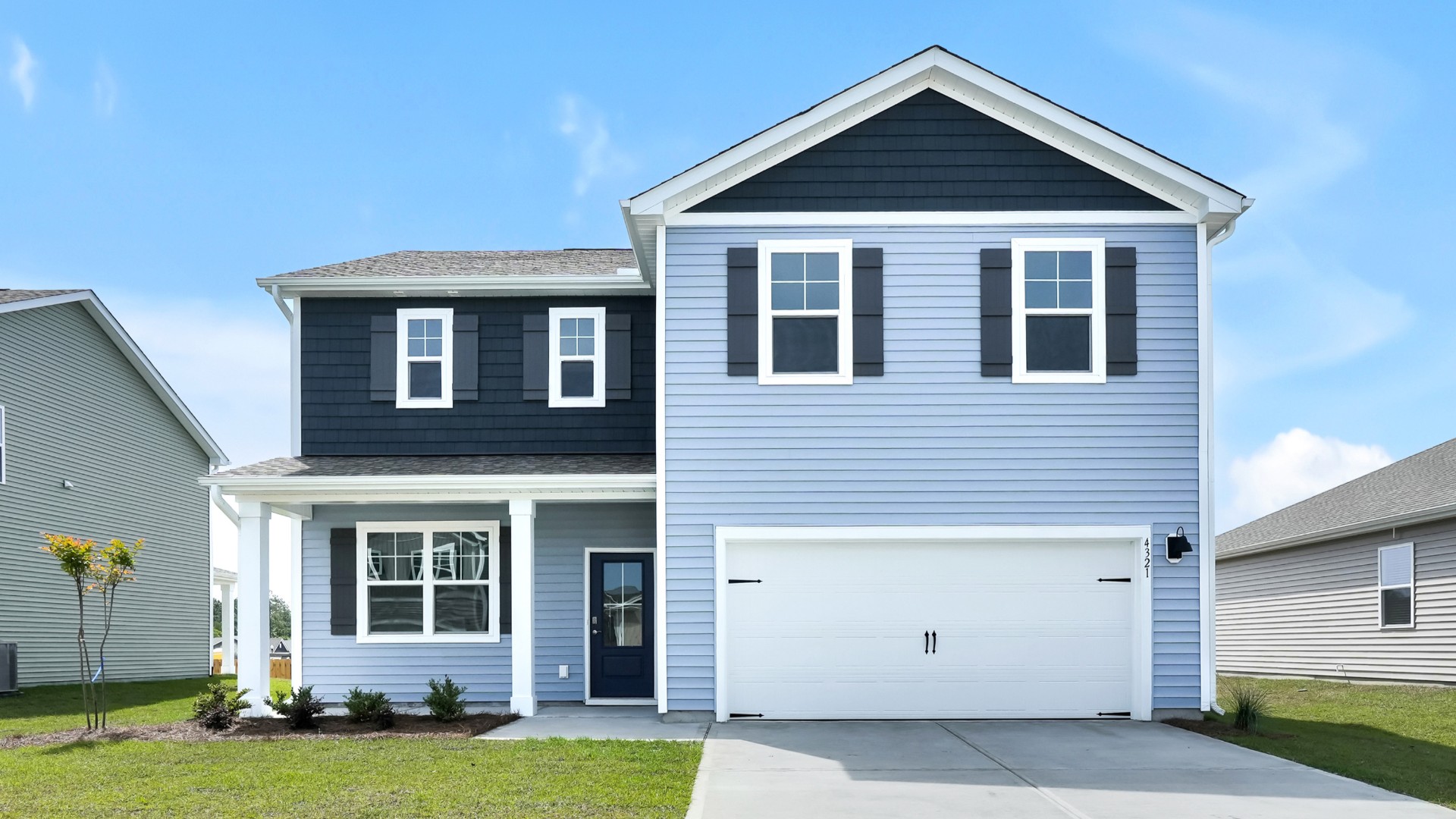 The open-concept kitchen features granite countertops and stainless steel appliances. The kitchen seamlessly connects to the dining and living areas, creating a great space for entertainment.
