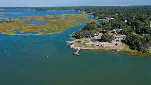 Situated in the heart of South Brunswick County, this rapidly expanding area lies just south of Wilmington, drawing people who appreciate a rural small-town vibe. Renowned for its stunning beaches, the region is a haven for water sports enthusiasts. Boaters can reach Sunset Harbor Boat Ramp in just 6 minutes. Golfers have access to numerous world-class courses and resorts. Beach lovers are in for a treat with quick drives to the finest beaches in Brunswick County like Oak Island, Holden Beach, and Ocean Isle in North Carolina, as well as Cherry Grove and North Myrtle Beach in South Carolina. Nearby Southport boasts a variety of retail and dining options, both big brands and local favorites. Residents will enjoy community amenities that include a pool, firepit, pavilion with fitness room.