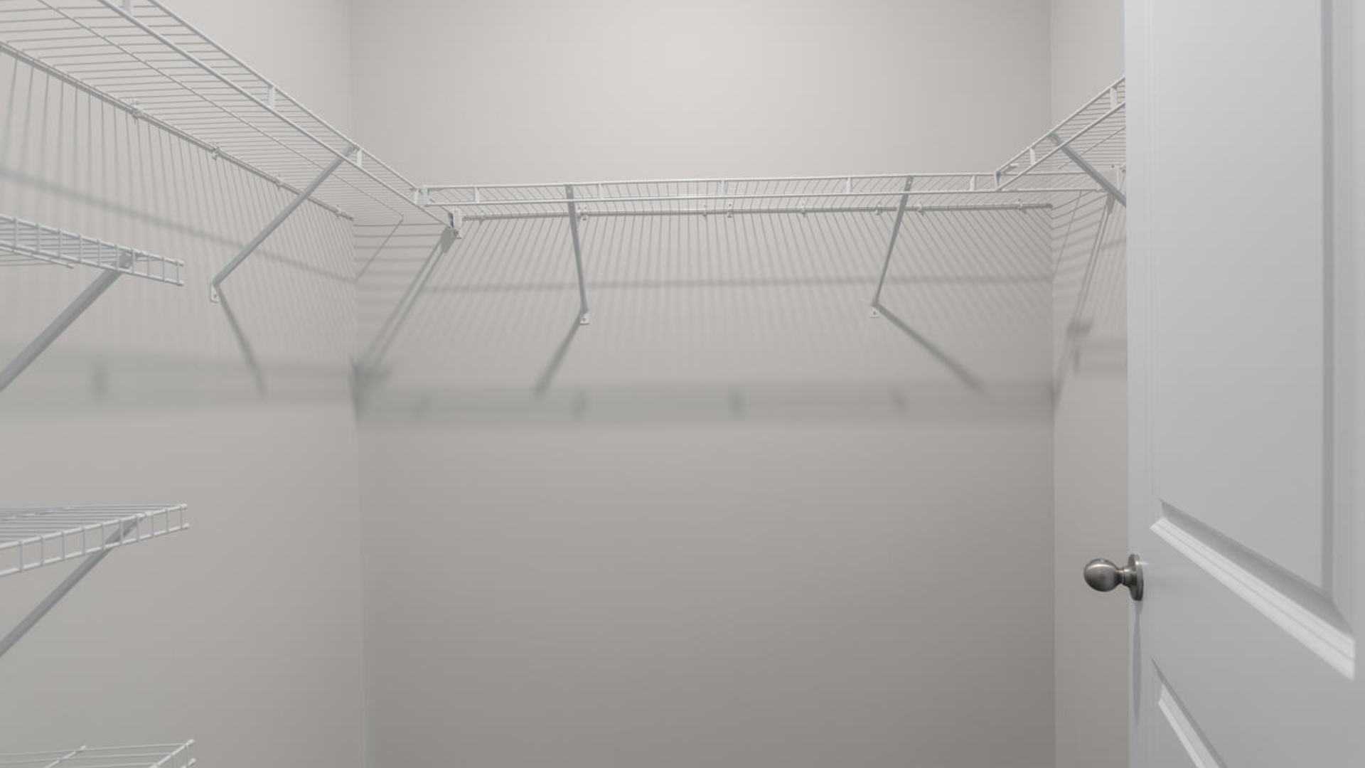 The Primary Suite offers a massive closet and a luxurious bathroom with a walk-in shower, linen closet, and dual vanity.