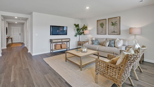 The Primary Suite offers a massive closet and a luxurious bathroom with a walk-in shower, linen closet, and dual vanity.