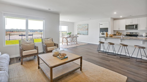 The Primary Suite offers a massive closet and a luxurious bathroom with a walk-in shower, linen closet, and dual vanity.