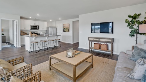 The Primary Suite offers a massive closet and a luxurious bathroom with a walk-in shower, linen closet, and dual vanity.