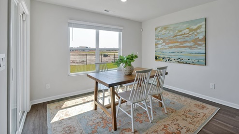 The Primary Suite offers a massive closet and a luxurious bathroom with a walk-in shower, linen closet, and dual vanity.