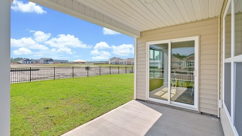 Enjoy the covered porch perfect for entertaining and enjoying the Carolina evenings.