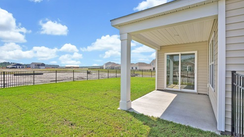 Enjoy the covered porch perfect for entertaining and enjoying the Carolina evenings.