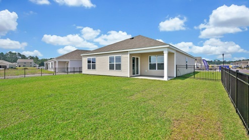 Enjoy the covered porch perfect for entertaining and enjoying the Carolina evenings.