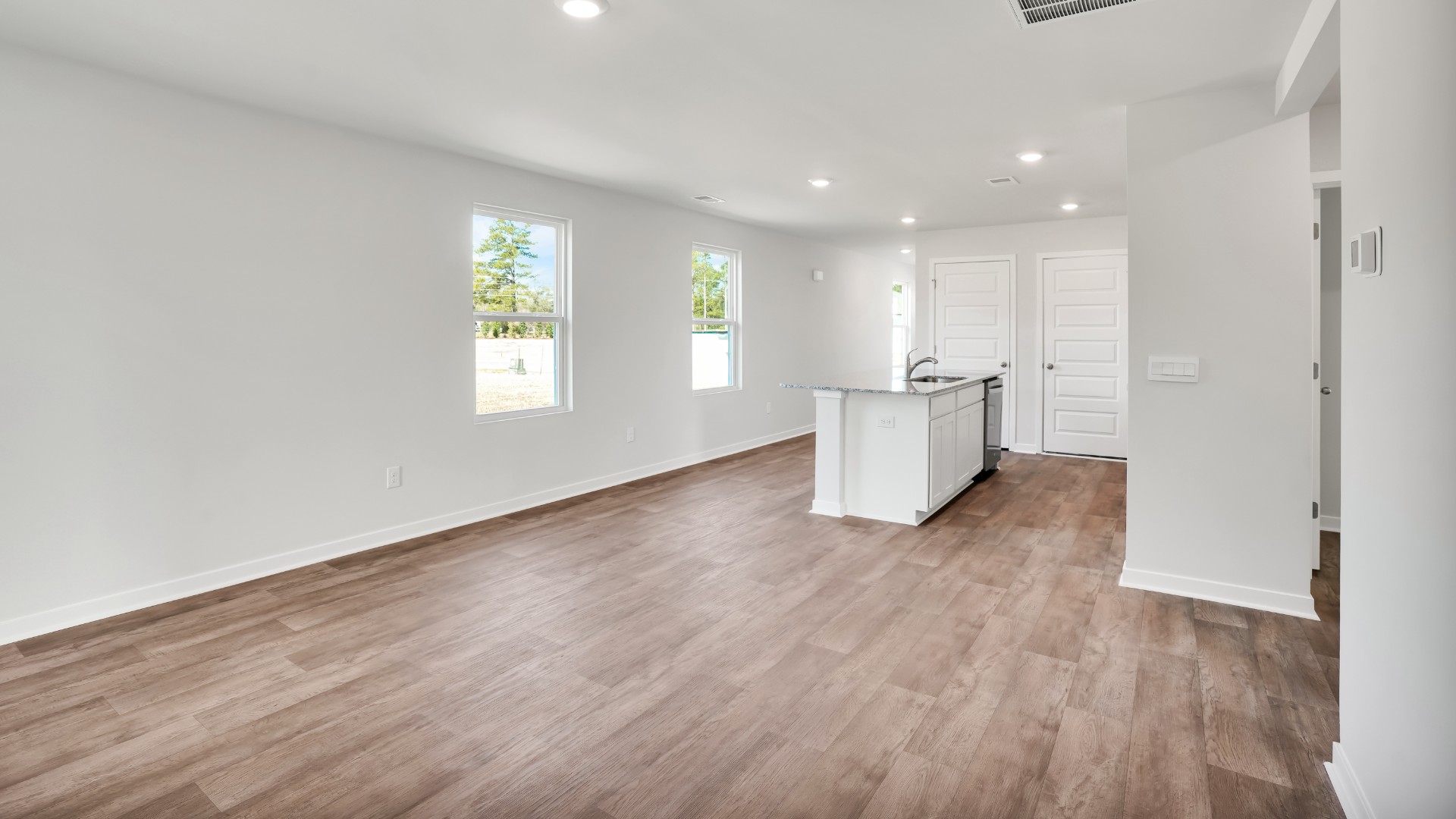 This appealing one-story layout optimizes living space with an open concept kitchen situated in between the living room and dining room and all bedrooms upstairs.