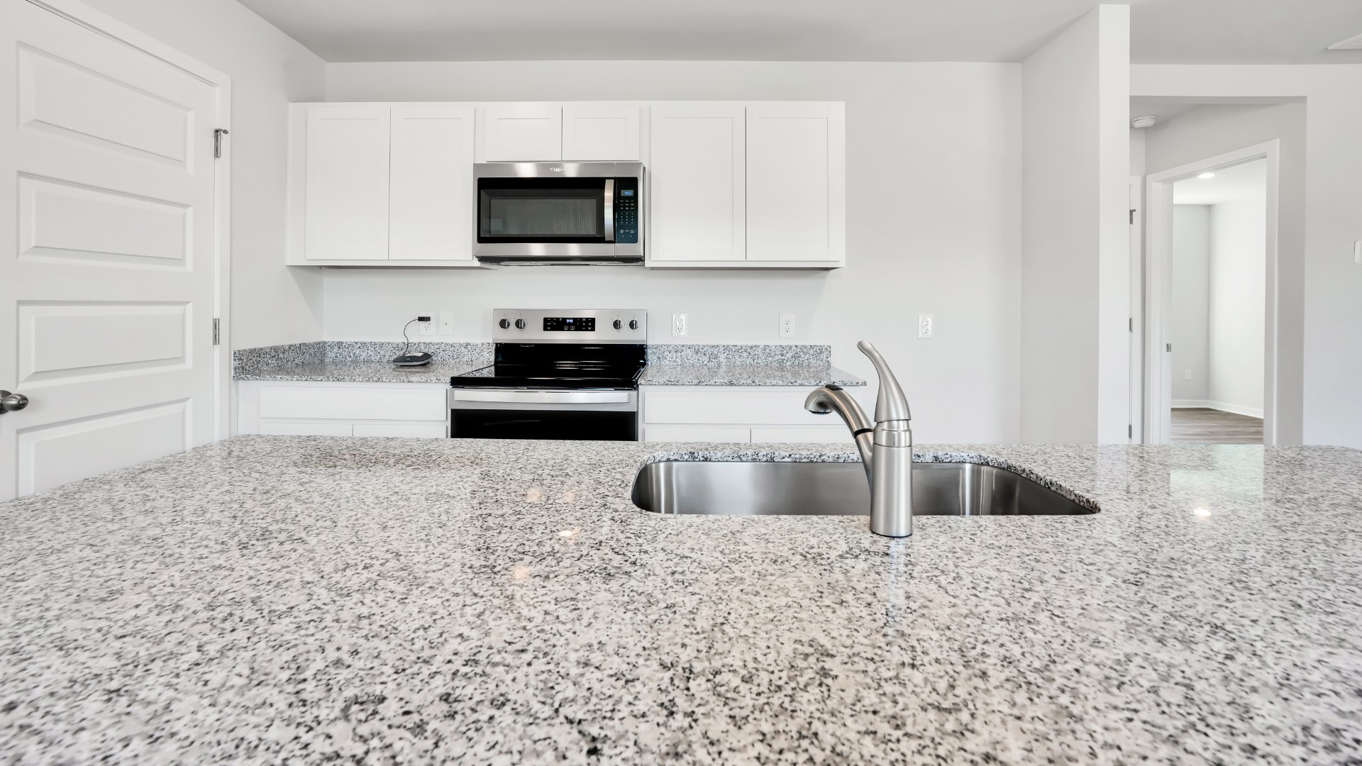This appealing one-story layout optimizes living space with an open concept kitchen situated in between the living room and dining room and all bedrooms upstairs.