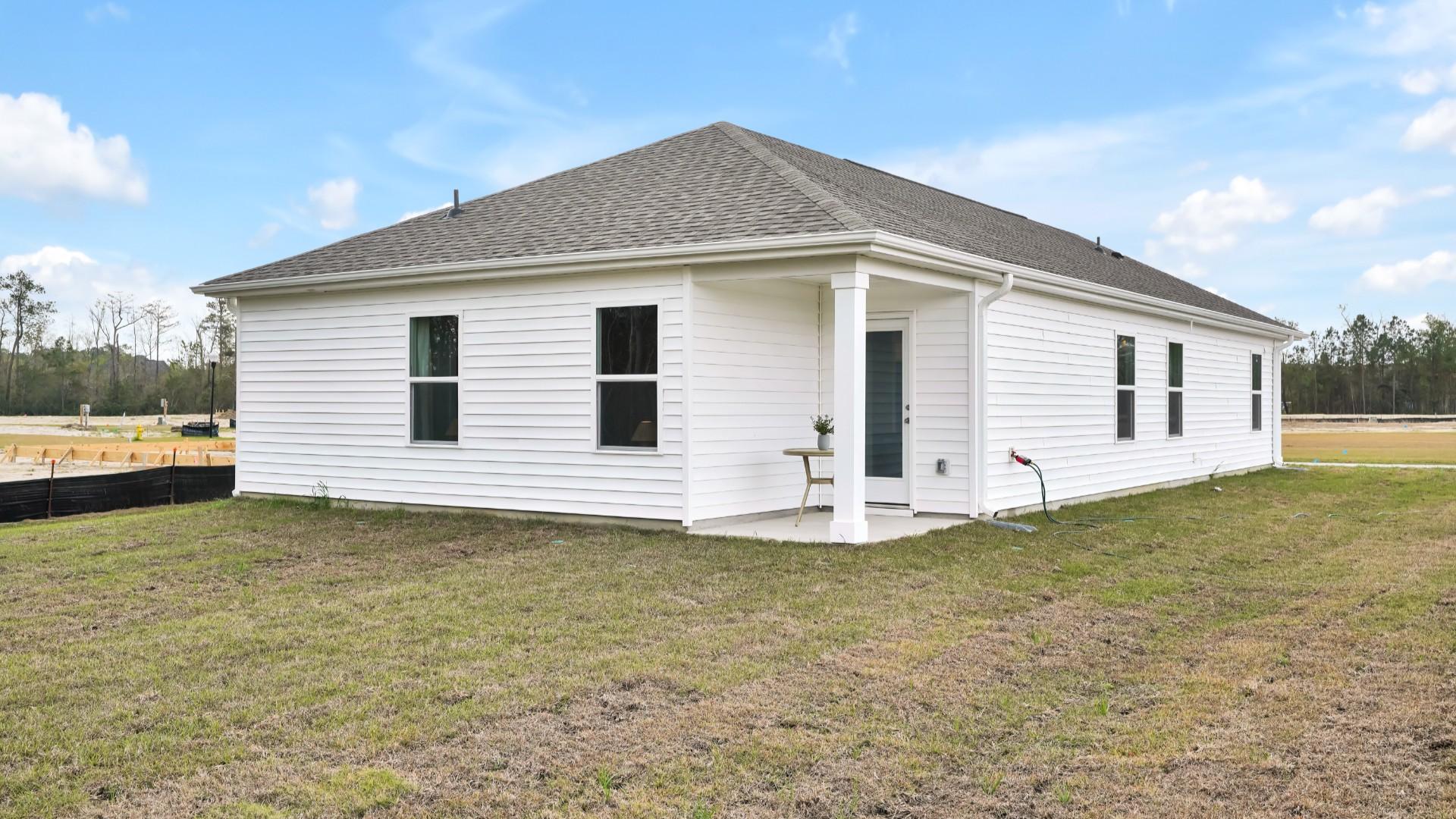 Enjoy the covered porch perfect for entertaining and enjoying the Carolina evenings.
