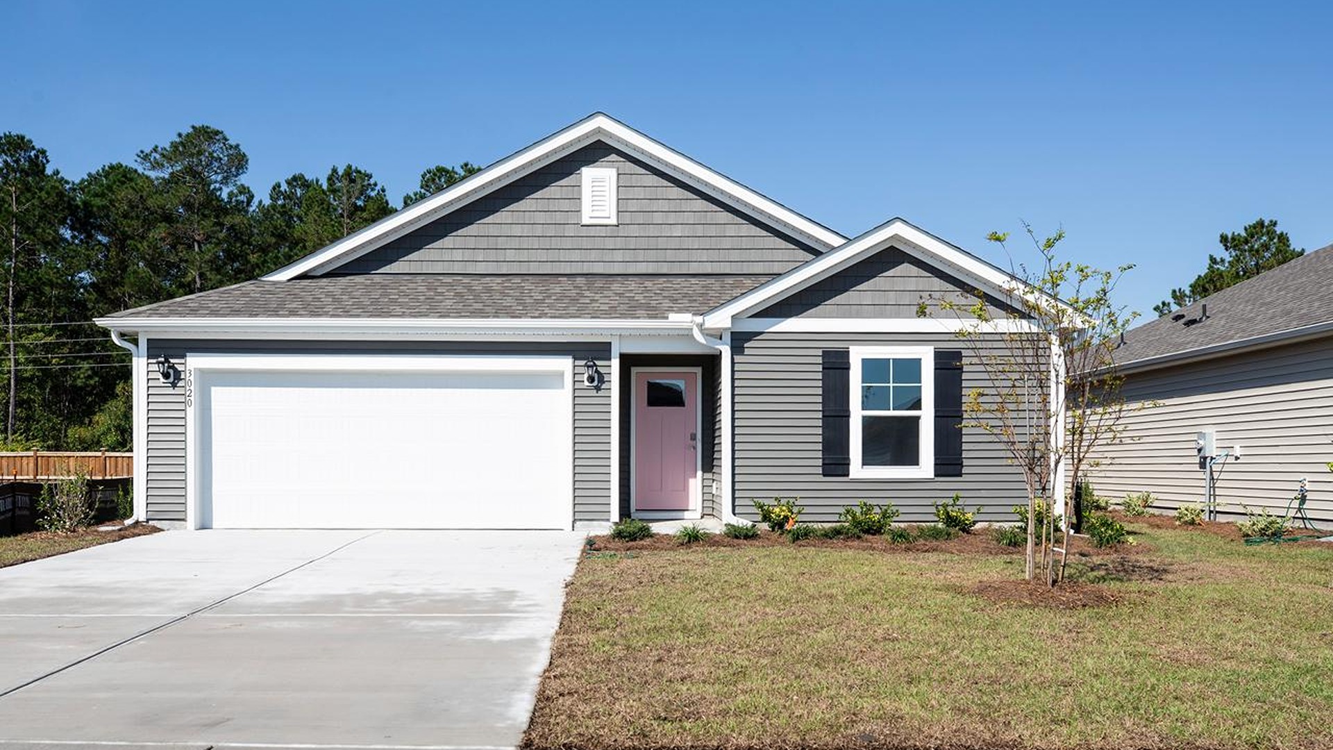The Kerry floor plan offers open living space and a 2-car garage. At the front are two guest bedrooms and a full bathroom, perfect for visitors or a home office. You’ll have plenty of room to grow with 3 bedrooms, 2 bathrooms, and 1,475 square feet of living space.