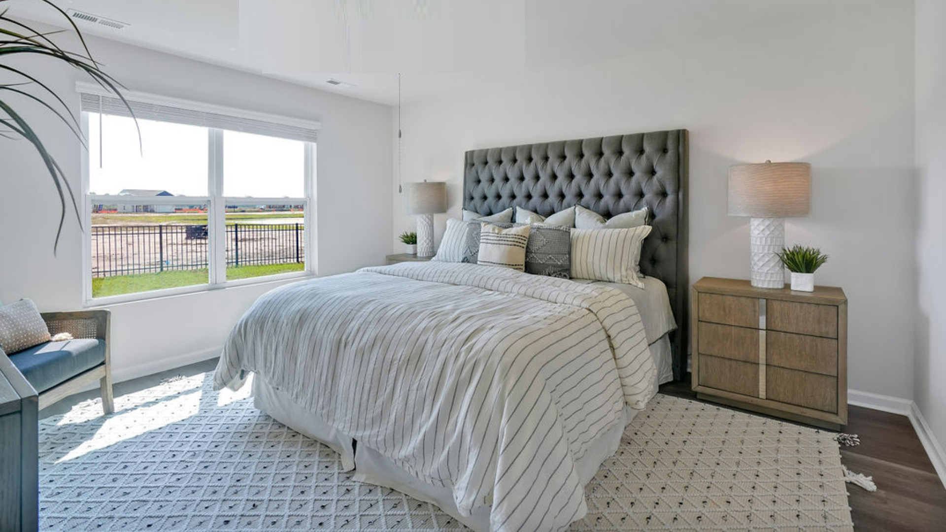 The primary suite offers a massive closet and a luxurious bathroom with a walk-in shower, linen closet, and dual vanity.