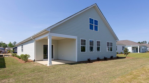 beautiful master planned and award winning community Brunswick Forest in Leland NC. Our Dover floor plan is a beautiful 2 story home with primarily first floor living.