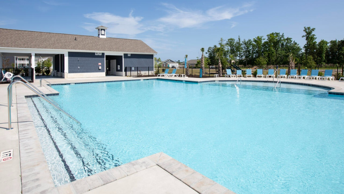 The white sand beaches and the beautiful bluish green waters of the Atlantic Ocean offer a perfect combination of adventure and relaxation. An almost year around mild climate means you can enjoy the warm salty air and all that the area offers year-round. Your new home at Waterside is less than a mile to the new high-rise bridge with a pedestrian lane where you will have sweeping views of the Atlantic when you are at it's crest.  Waterside is an easy drive to Wilmington and Marine Corps Base Camp Lejeune and all of the conveniences are nearby. Homeowners enjoy the community amenities that include a large swimming pool, pavilion with fitness room, firepit, sand volleyball, tot lot, sport court and walking trails.