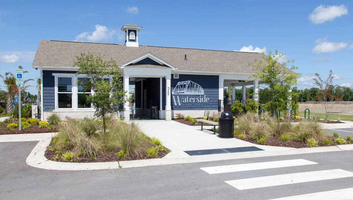 The white sand beaches and the beautiful bluish green waters of the Atlantic Ocean offer a perfect combination of adventure and relaxation. An almost year around mild climate means you can enjoy the warm salty air and all that the area offers year-round. Your new home at Waterside is less than a mile to the new high-rise bridge with a pedestrian lane where you will have sweeping views of the Atlantic when you are at it's crest.  Waterside is an easy drive to Wilmington and Marine Corps Base Camp Lejeune and all of the conveniences are nearby. Homeowners enjoy the community amenities that include a large swimming pool, pavilion with fitness room, firepit, sand volleyball, tot lot, sport court and walking trails.