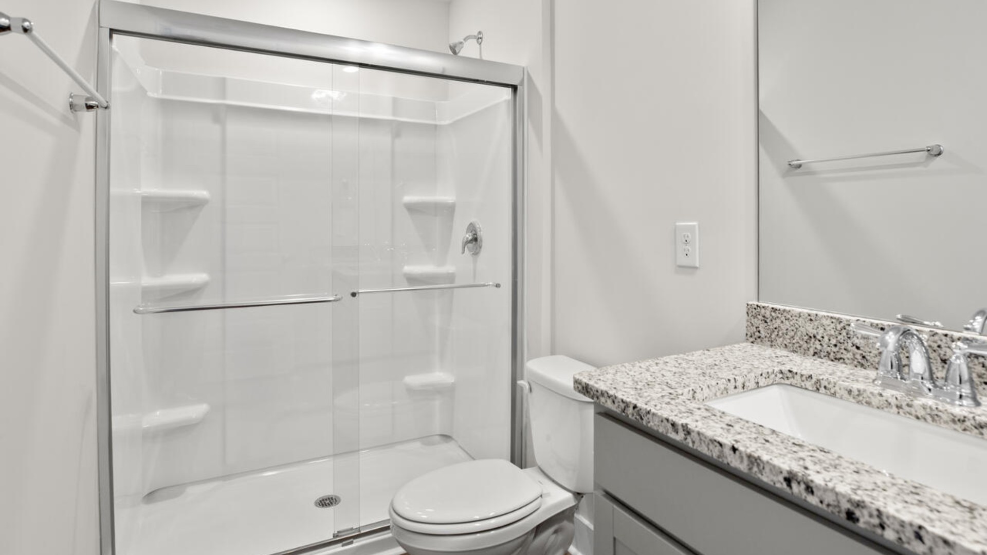 The second floor features the primary bedroom with a walk-in closet and double vanities