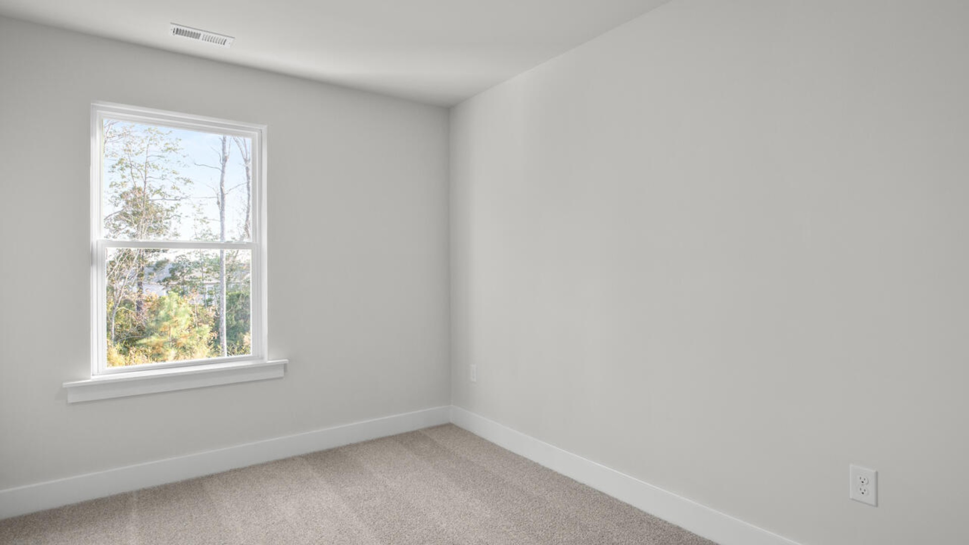 It also includes two additional bedrooms, a shared bathroom, and a laundry room for convenience. The bathrooms are equally elegant, featuring matching granite and a primary suite with a glass shower that feels like your own personal spa.