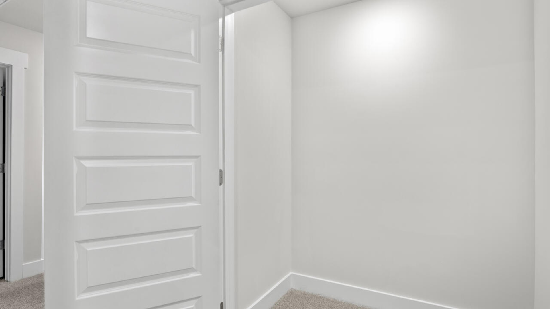 It also includes two additional bedrooms, a shared bathroom, and a laundry room for convenience. The bathrooms are equally elegant, featuring matching granite and a primary suite with a glass shower that feels like your own personal spa.