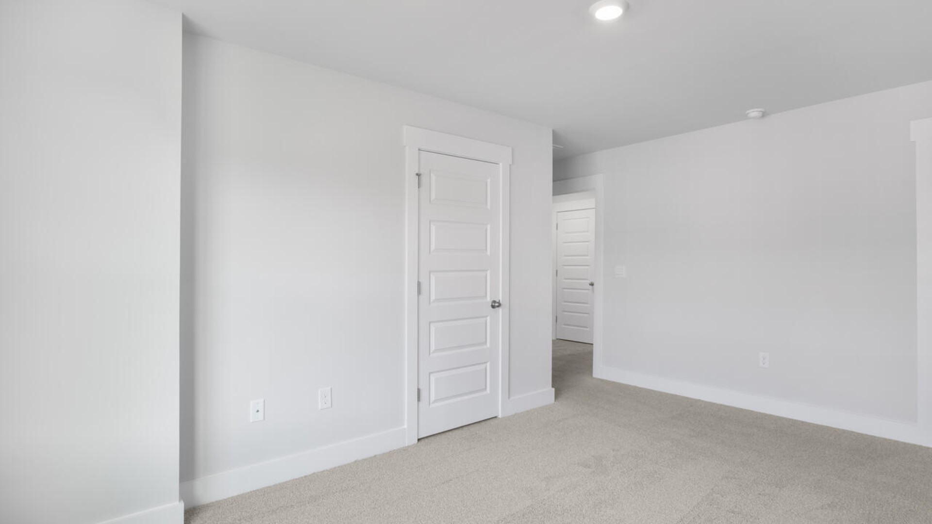 The second floor features the primary bedroom with a walk-in closet and double vanities