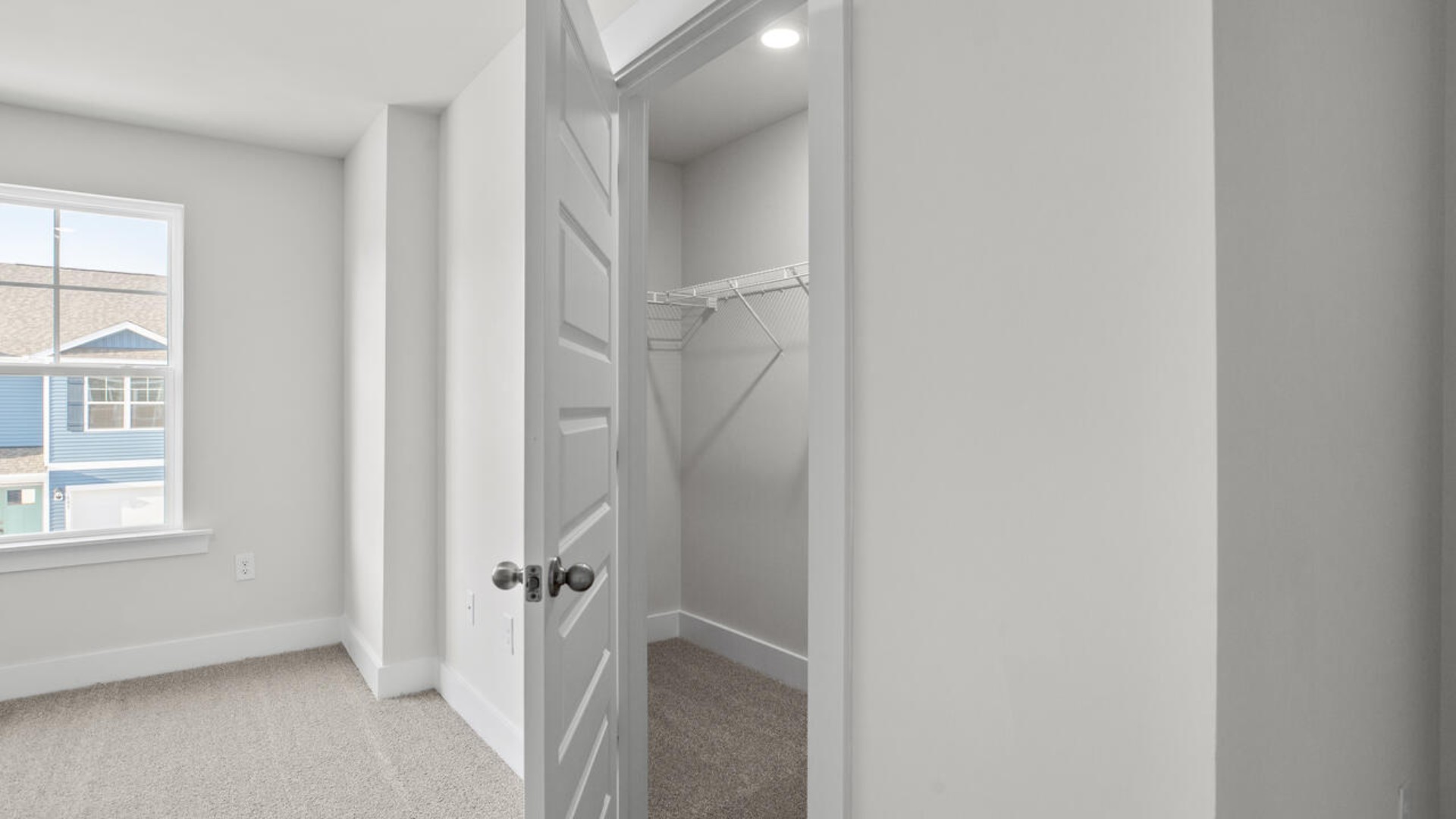 The second floor features the primary bedroom with a walk-in closet and double vanities. It also includes two additional bedrooms, a shared bathroom, and a laundry room for convenience. The bathrooms are equally elegant, featuring matching granite and a primary suite with a glass shower that feels like your own personal spa.