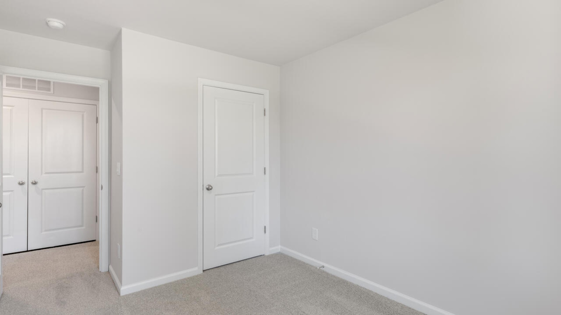 The second floor features the primary bedroom with a walk-in closet and double vanities. It also includes two additional bedrooms, a shared bathroom, and a laundry room for convenience. The bathrooms are equally elegant, featuring matching granite and a primary suite with a glass shower that feels like your own personal spa.