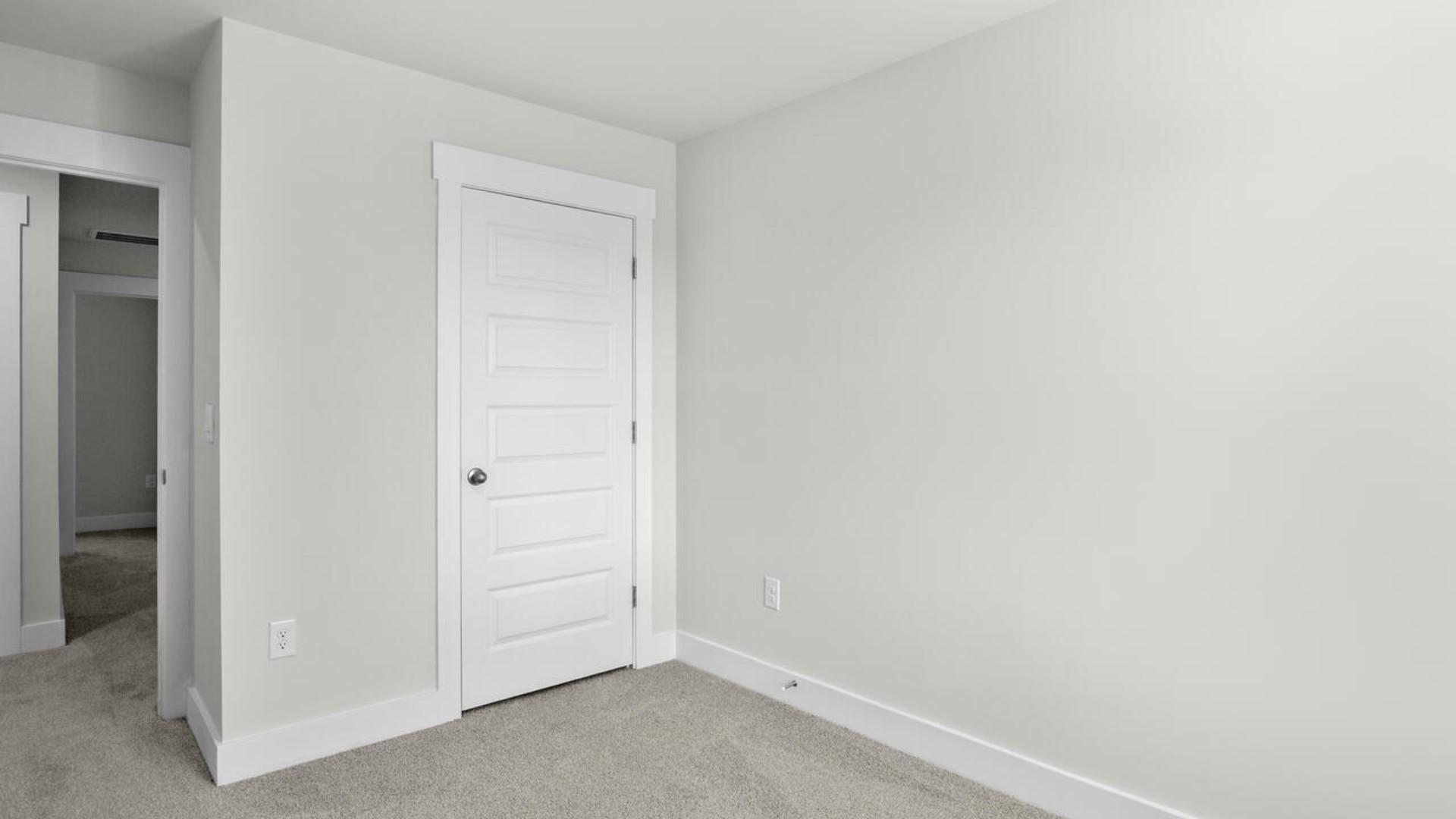 It also includes two additional bedrooms, a shared bathroom, and a laundry room for convenience. The bathrooms are equally elegant, featuring matching granite and a primary suite with a glass shower that feels like your own personal spa.