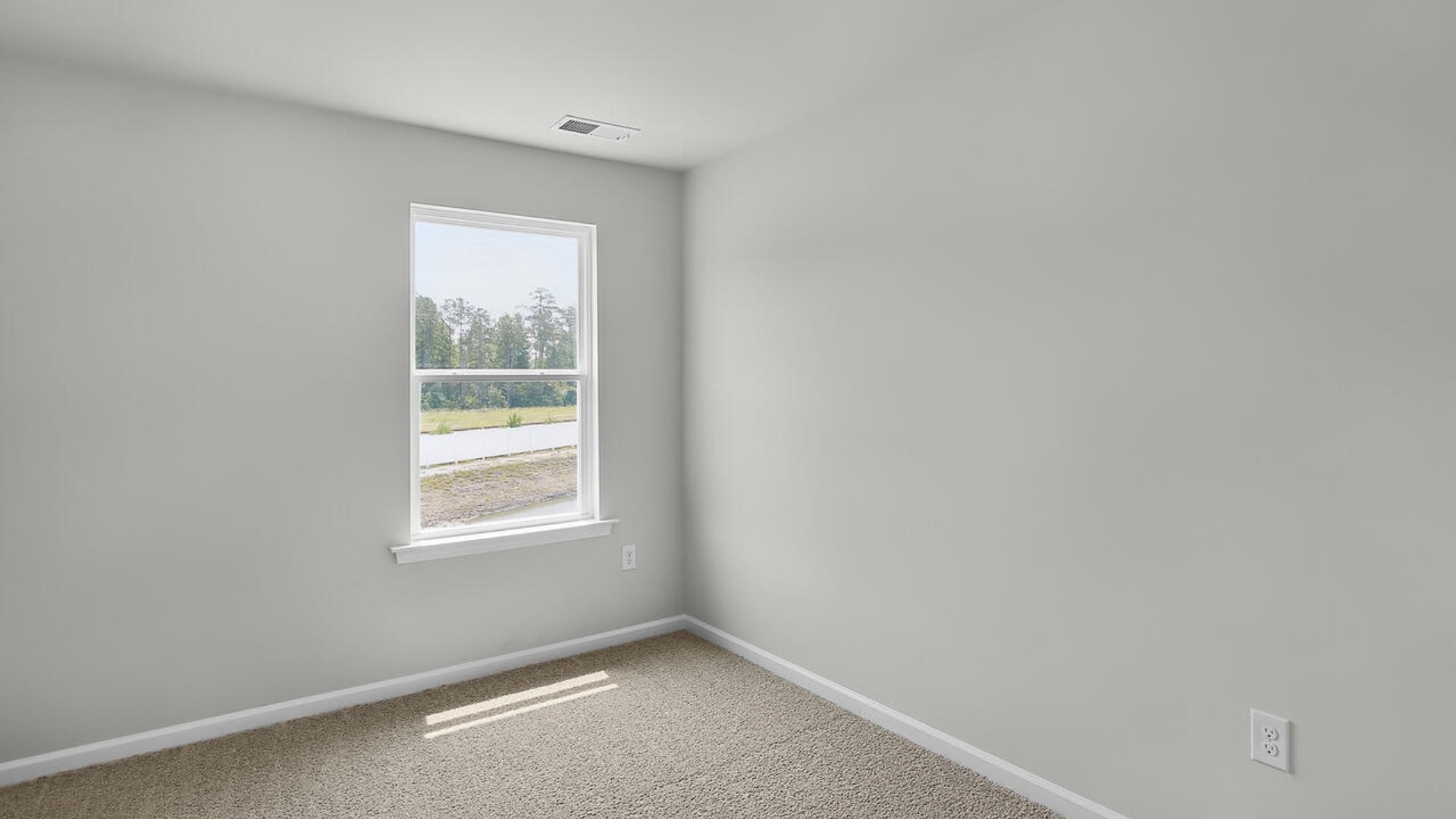 The second floor features the primary bedroom with a walk-in closet and double vanities. It also includes two additional bedrooms, a shared bathroom, and a laundry room for convenience.