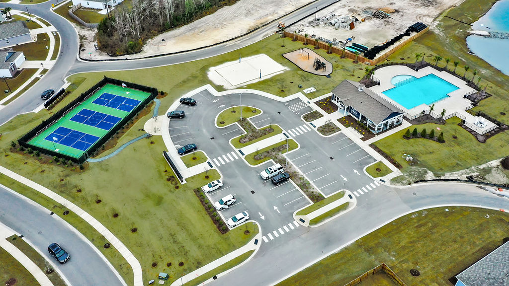 Homeowners enjoy the community amenities that include a large swimming pool, pavilion with fitness room, firepit, sand volleyball, tot lot, sport court and walking trails.