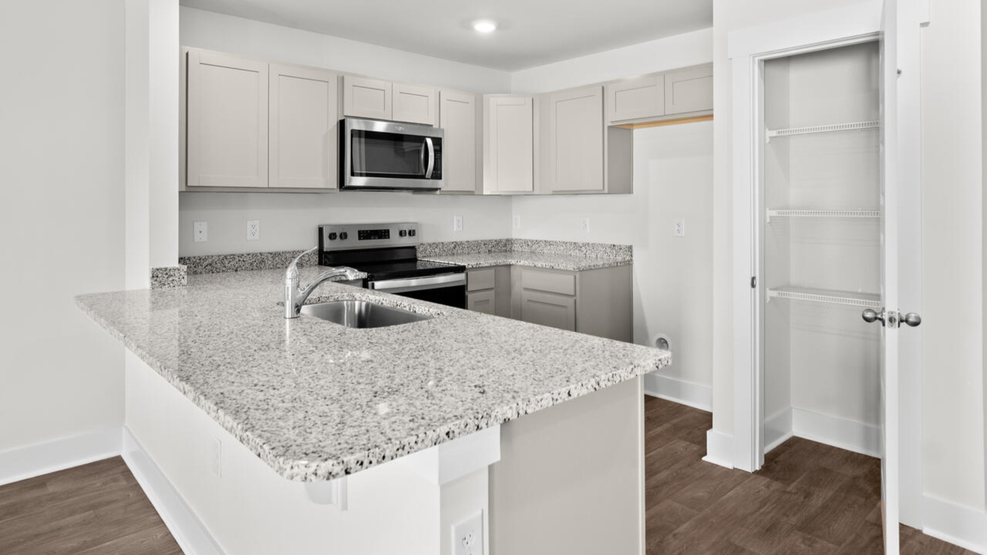 Your new Pearson features an open concept first floor anchored by a spacious kitchen with granite countertops, stainless steel appliances and a peninsula bar that overlooks your family and dining room. I