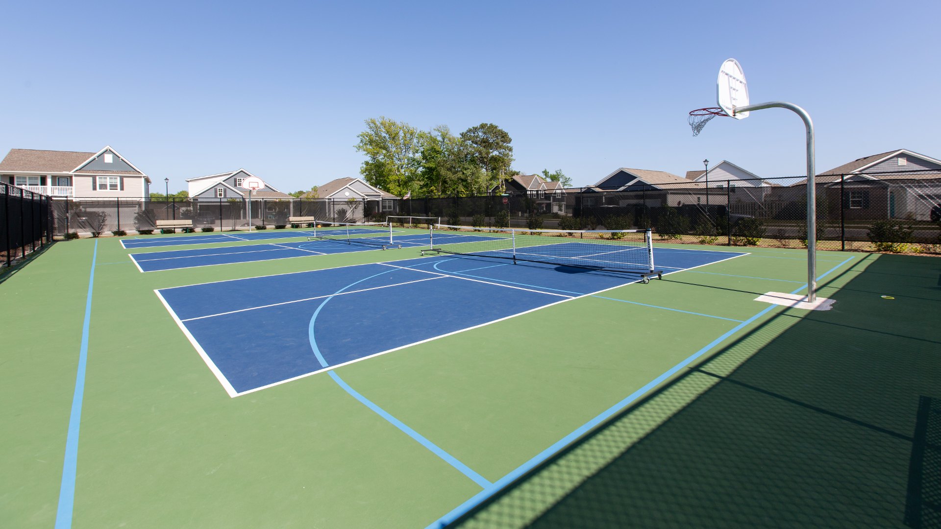 Homeowners enjoy the community amenities that include a large swimming pool, pavilion with fitness room, firepit, sand volleyball, tot lot, sport court and walking trails.