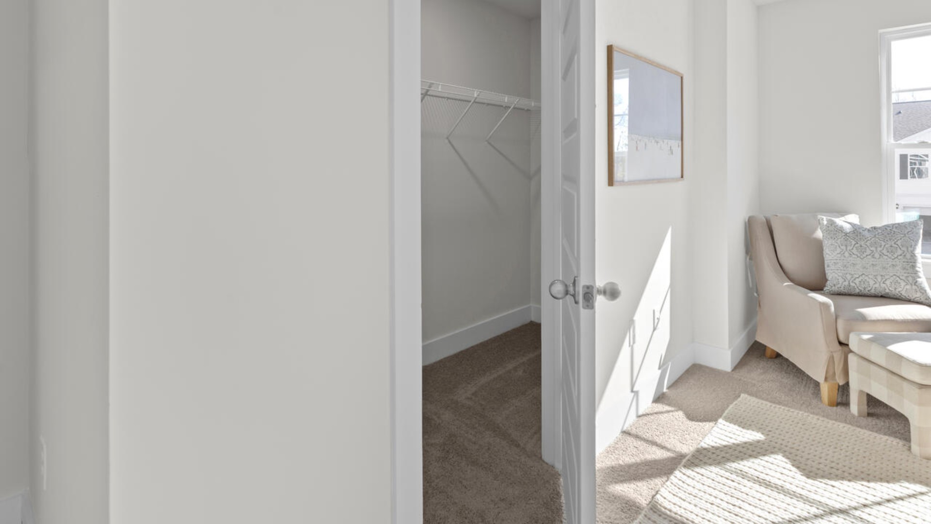 he second floor features the primary bedroom with a walk-in closet and double vanities.