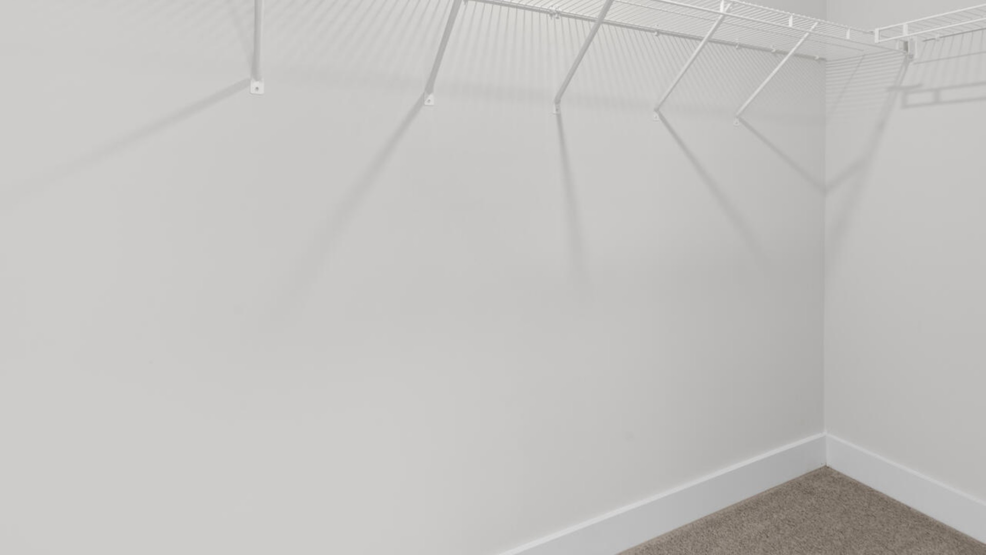 he second floor features the primary bedroom with a walk-in closet and double vanities.