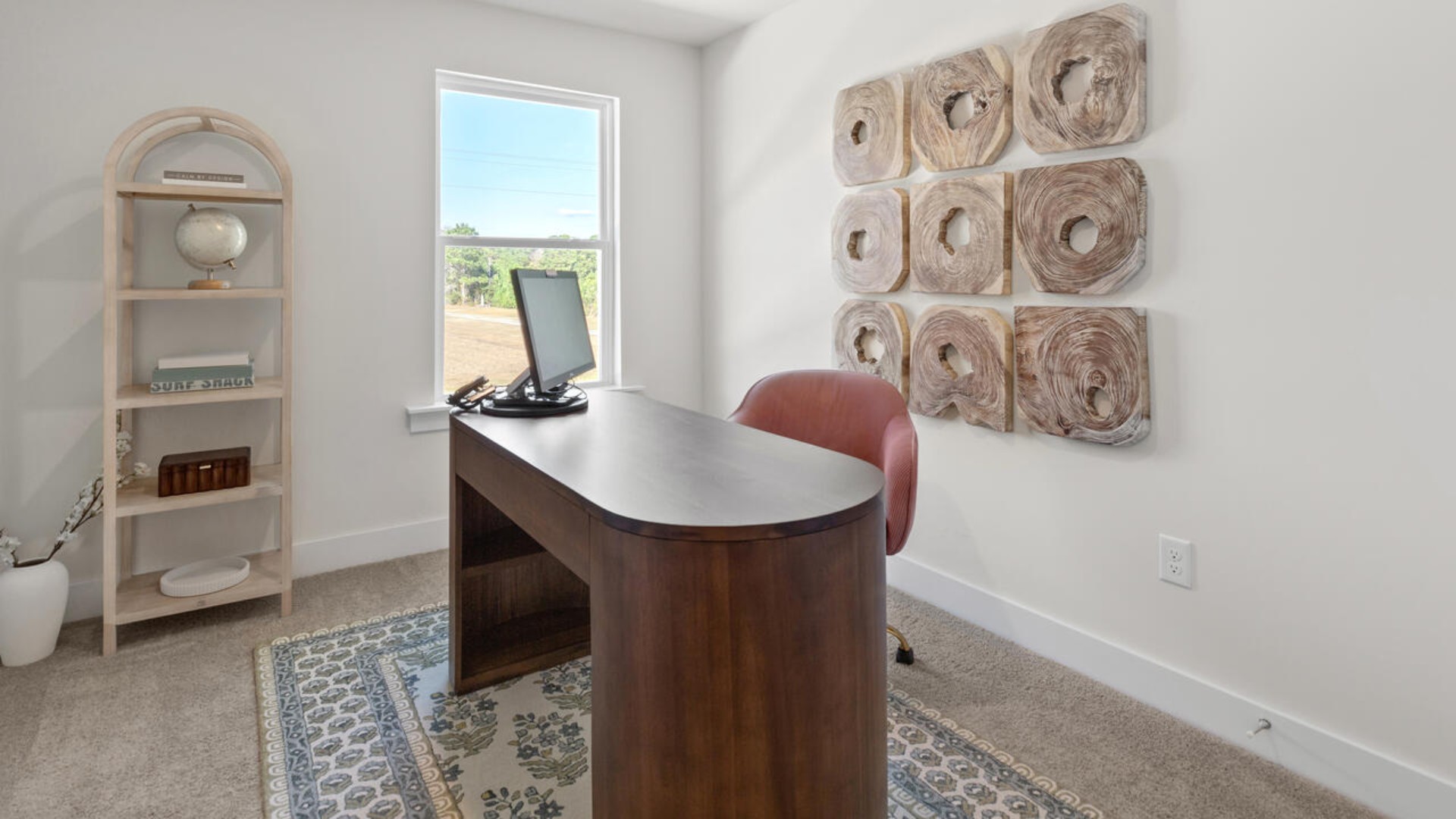 . It also includes two additional bedrooms, a shared bathroom, and a laundry room for convenience. The bathrooms are equally elegant, featuring matching granite and a primary suite with a glass shower that feels like your own personal spa.