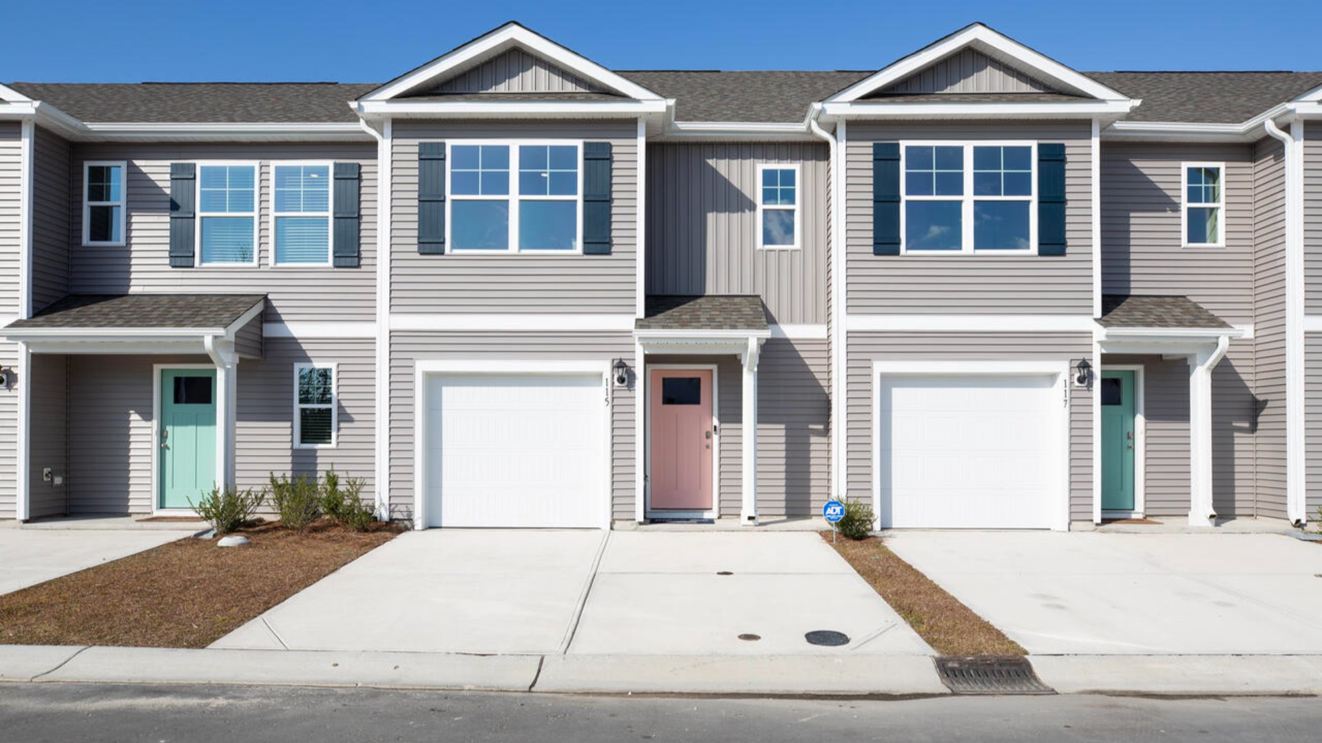 Welcome to 115 N Grassland Road in Surf City, NC, located in our Waterside community. The Pearson floor plan is a 3-bedroom, 2.5-bath, 1,418 sq ft gem that combines modern convenience with style and charm.