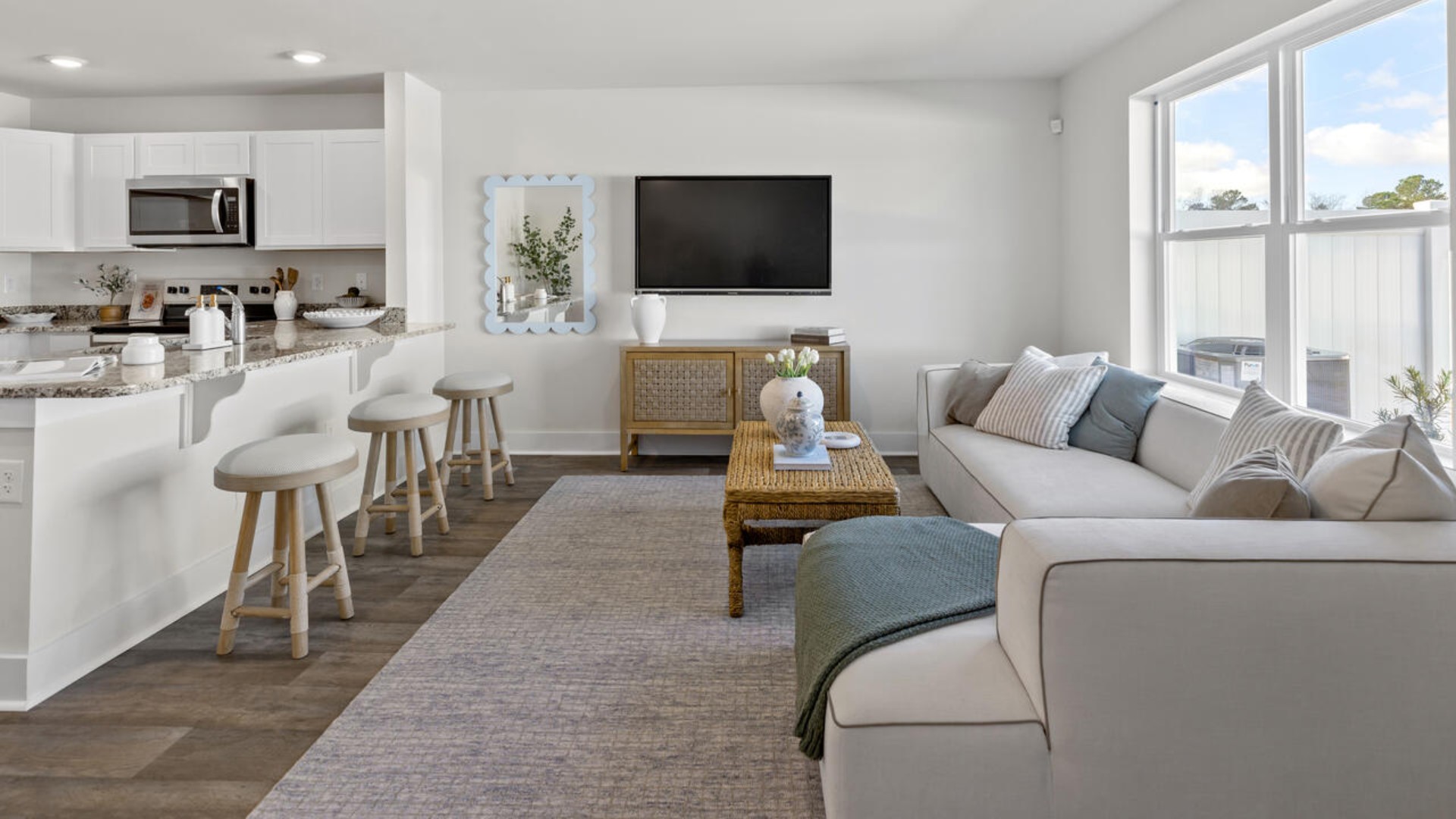 Step inside and discover a bright and airy open floor plan designed for both relaxing and entertaining.